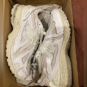 New Balance white sneakers